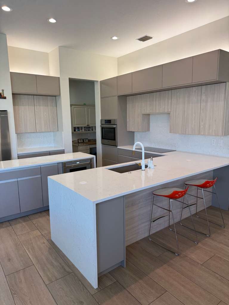 After photo of a Lakewood Ranch two-tone European kitchen remodel by The Kitchen Depot