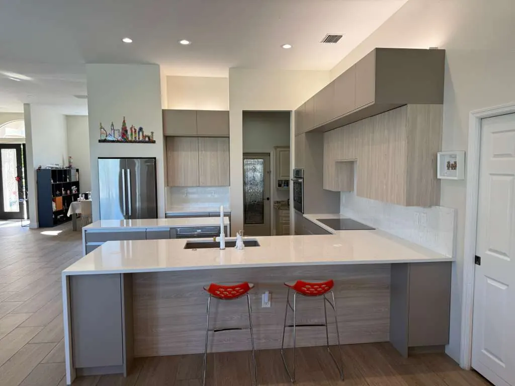 After: Lakewood Ranch two-tone European kitchen with waterfall island