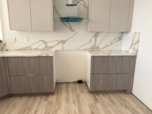 Rotonda West FL Calacatta quartz waterfall island by The Kitchen Depot