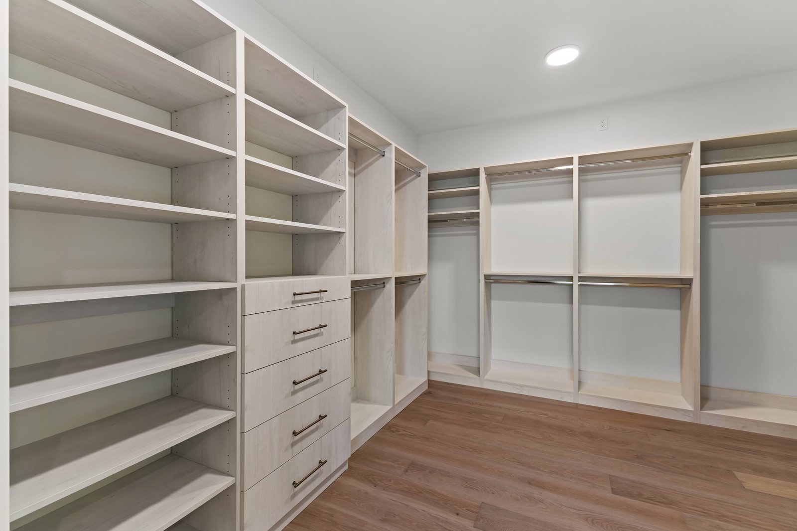 Venice FL custom walk-in closet storage by The Kitchen Depot