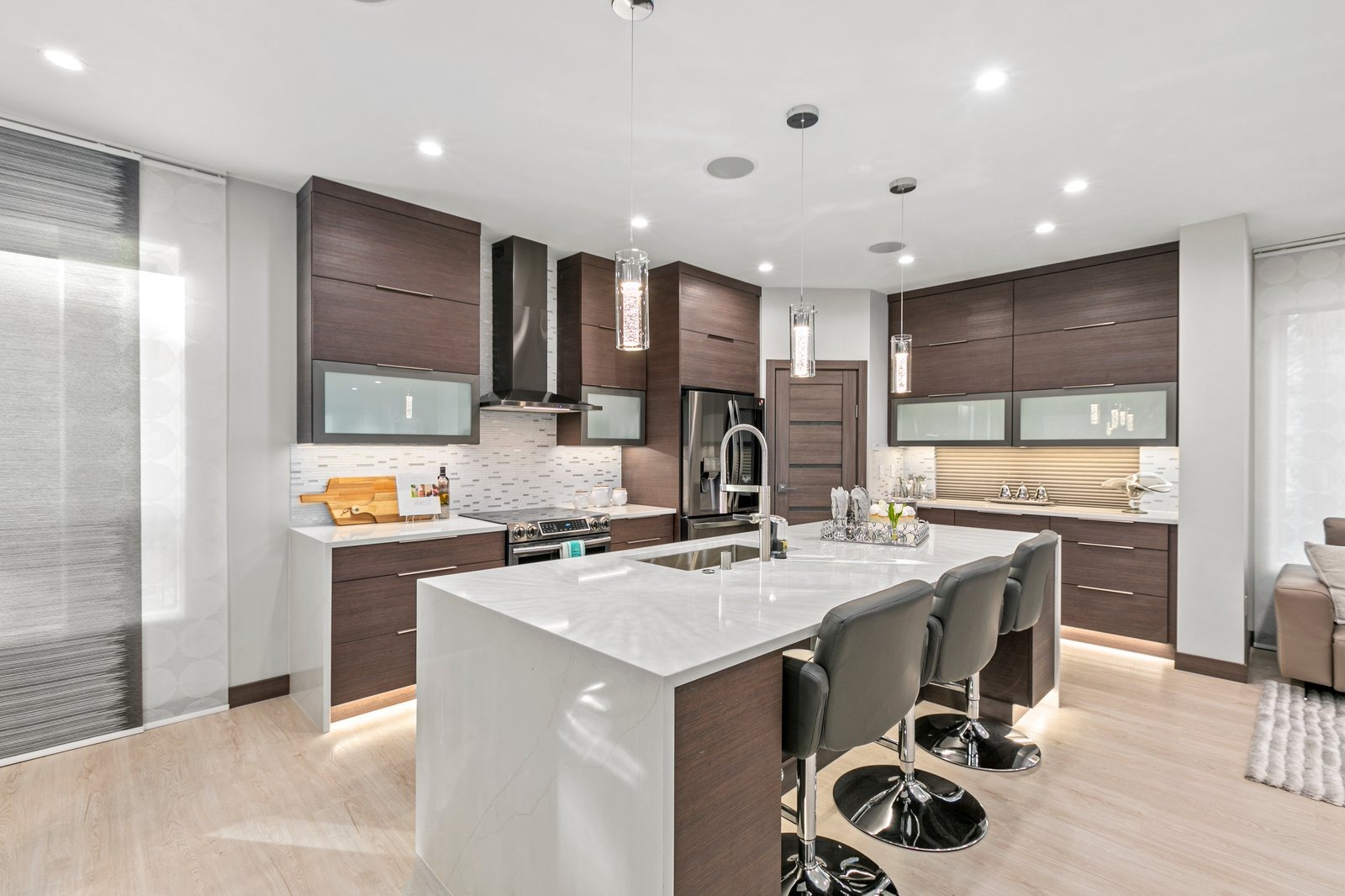 Modern kitchen remodel Englewood FL — quartz island, pendant lighting